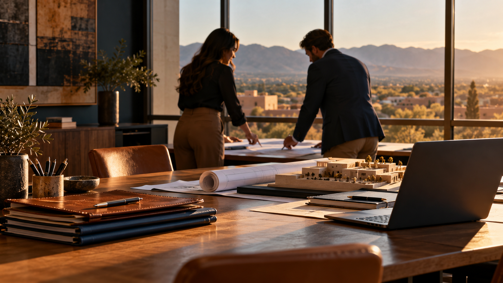 Professionals reviewing work together in a New Mexico office